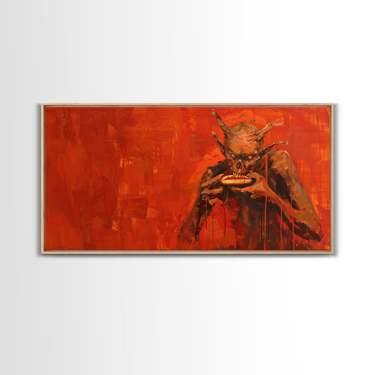 Scary Demon Having a Hot Dog, must be a baseball fan. Funny Halloween Wall Art Framed Canvas Print