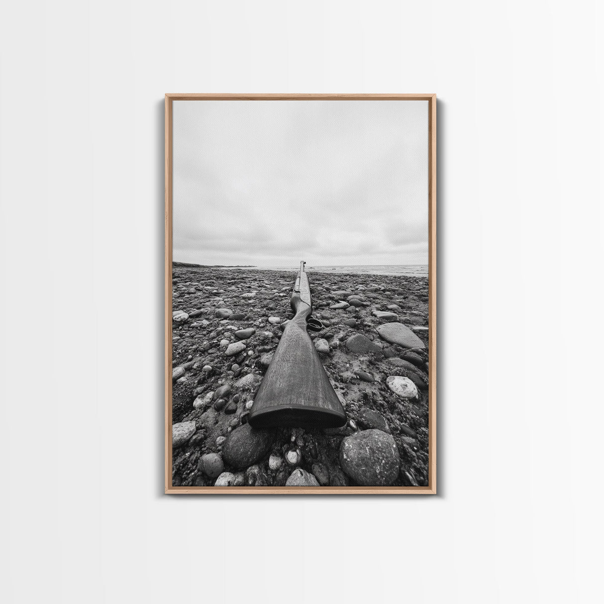 Rifle on Pebbles, Rustic Coastal, Survivalist Aesthetic, Canvas Print, Cabin Wall Art, Masculine Decor, Nature Minimalist Style