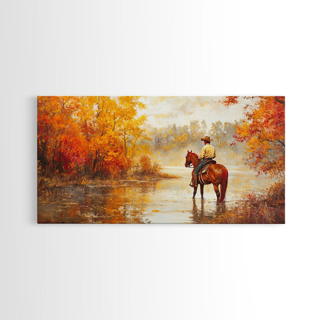 Cowboy sitting by campfire near a lake in the woods with autumn leaves, Framed Canvas Print, moody fall wall art, rustic western home decor