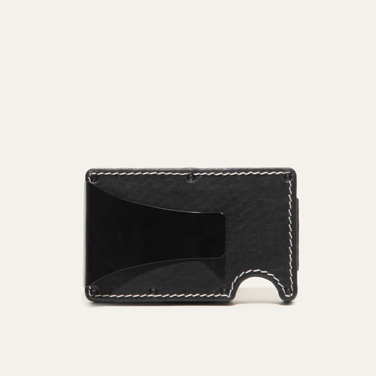 Mondrian Card Case by WILL Leather Goods in black leather, front view with credit cards and folded cash held by the steel money clip.
