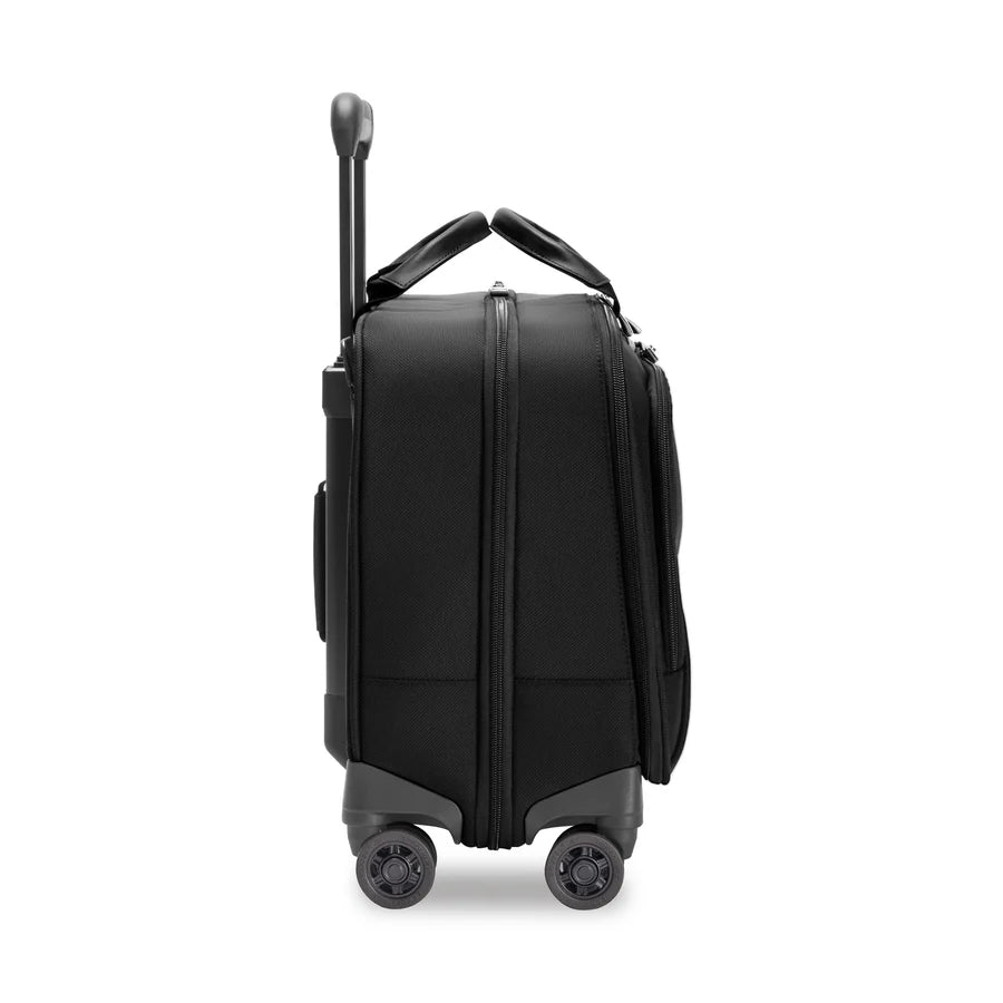 Briggs & Riley @work Large Spinner Brief in Black – Side view showing spinner wheels