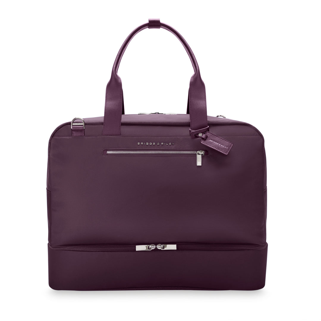 Briggs & Riley Rhapsody Weekender Tote in plum with matching plum leather handles and trim, front zip pocket, and leather fob, shown from the front