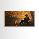 Cozy autumnal Framed Canvas Print featuring a woman with a mug, surrounded by vibrant fall leaves, perfect seasonal wall art for cozy spaces