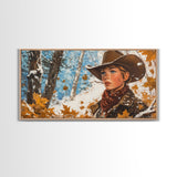 Western-inspired Framed Canvas Print of a woman on horseback in a snowy mountain landscape, holiday wall art and winter wonderland vibes