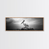Coastal Pelican, Ocean Rock, Tranquil Wildlife Scene, Framed Canvas Print, Beach House Wall Art, Seaside Nature Decor, Moody Tones