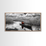 Solitary Canoe, Peaceful Waters, Cloudy Sky, Red Shirt, Framed Canvas Print, Nature Explorer Gift, Cabin Wall Art, Rustic Fall Scene