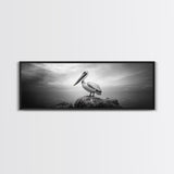 Coastal Pelican, Ocean Rock, Tranquil Wildlife Scene, Framed Canvas Print, Beach House Wall Art, Seaside Nature Decor, Moody Tones