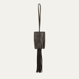 WILL Leather Goods key fob tassel in black leather, fringed tassel with embossed WILL Leather Goods patch and brass loop, on a white background.