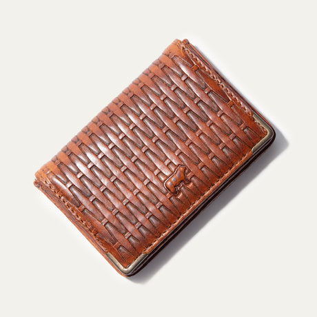 Will Leather Goods cognac basketweave-texture leather business card holder, corner angle view with brass corner guard