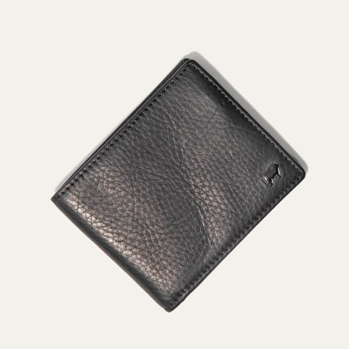 Will Leather Goods Classic Billfold Wallet in black leather, closed, top-down view on a white background.