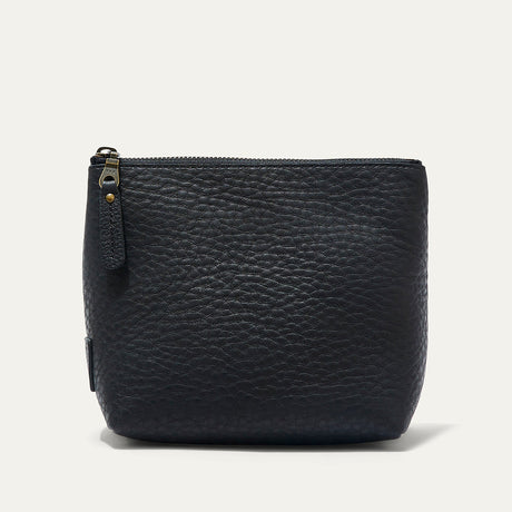 Black pebbled leather zip pouch shown straight-on, with the zipper pull visible on the front