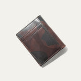 Angled close-up of the green camouflage leather on the closed Military Front Pocket wallet, showing the mottled camo pattern and stitching.