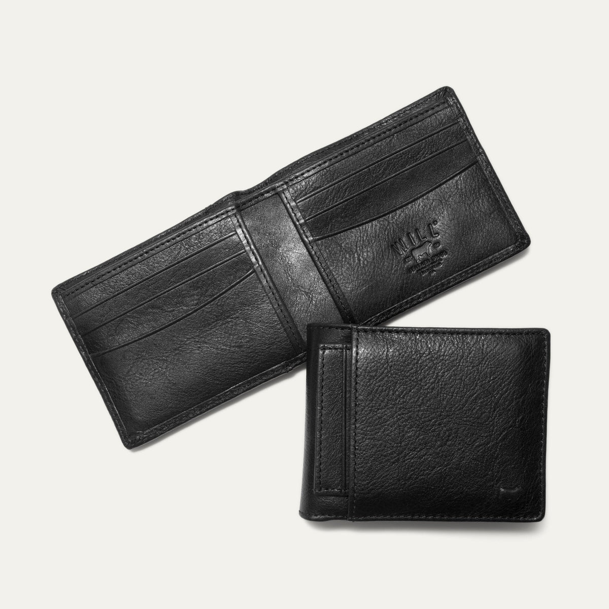 Companion Billfold Wallet by WILL Leather Goods in black leather, bifold open at a different angle showing the card slots and detachable front-pocket card case.
