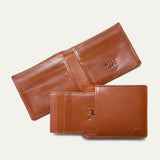 Companion Billfold Wallet by WILL Leather Goods in cognac leather, bifold open showing multiple card slots and a separate detachable front-pocket card case with embossed WILL Leather Goods logo.