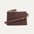 Will Leather Goods cognac leather small zip pouch, flat lay with wristlet strap