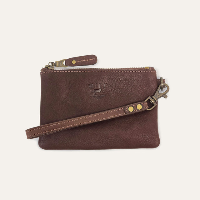 Will Leather Goods cognac leather small zip pouch, flat lay with wristlet strap