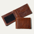 The William Collection Mogul Billfold in cognac basketweave-embossed leather, shown open (trifold with mesh ID window) and closed (bifold), on a white background.