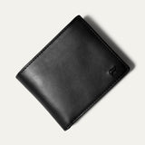 Black leather billfold wallet closed, straight-on front view, on a white background.
