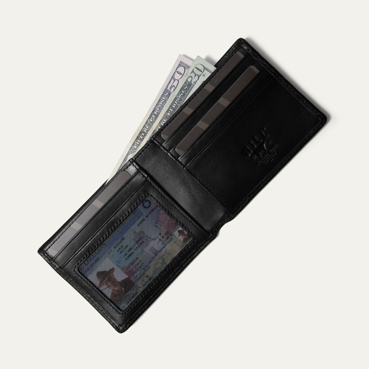 Black leather billfold wallet open, card pocket holding cash and an ID visible through the clear window, on a white background.