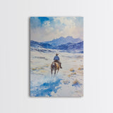 Cowboy riding through snowy mountain pass, Framed Canvas Print, western winter landscape wall art, farmhouse holiday decor Christmas gift