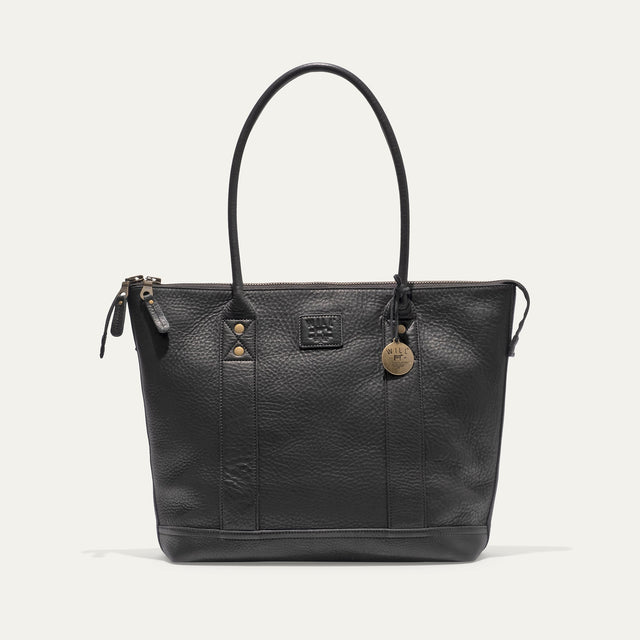 Will Leather Goods black pebbled leather zip tote, front view with both handles raised and brass WILL charm