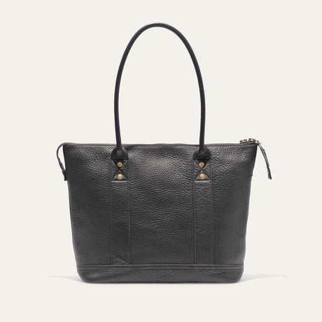 Black pebbled leather zip tote, straight-on front view showing the WILL brand patch and zip pull