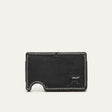 Mondrian Card Case by WILL Leather Goods in black leather, rear panel view with white contrast stitching and embossed WILL Leather Goods dog logo, steel money clip visible at the edge.