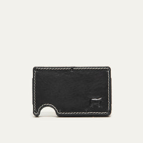 Mondrian Card Case by WILL Leather Goods in black leather, rear panel view with white contrast stitching and embossed WILL Leather Goods dog logo, steel money clip visible at the edge.