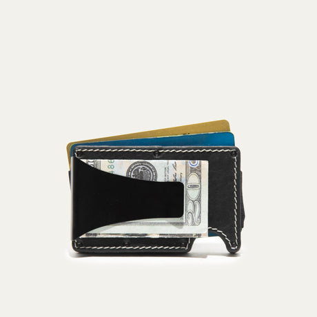 Mondrian Card Case by WILL Leather Goods in brown leather, rear panel view with white contrast stitching and embossed WILL Leather Goods dog logo, steel money clip visible at the edge.