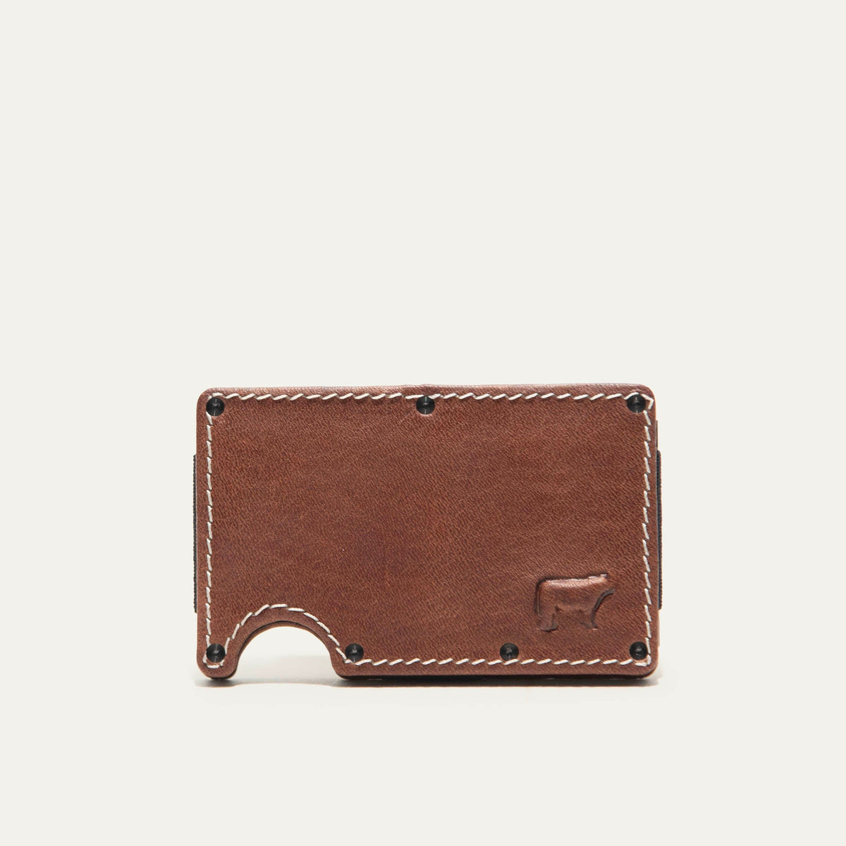 Mondrian Card Case by WILL Leather Goods in brown leather, front view with credit cards (including a Delta card) and folded cash held by the steel money clip.
