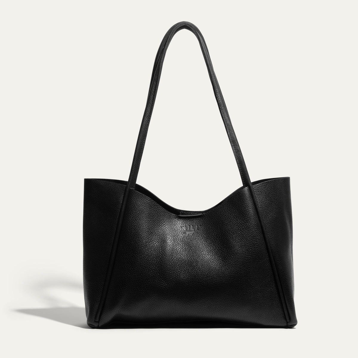Front-facing view of the black Workshop Tote in pebbled leather on a white background.