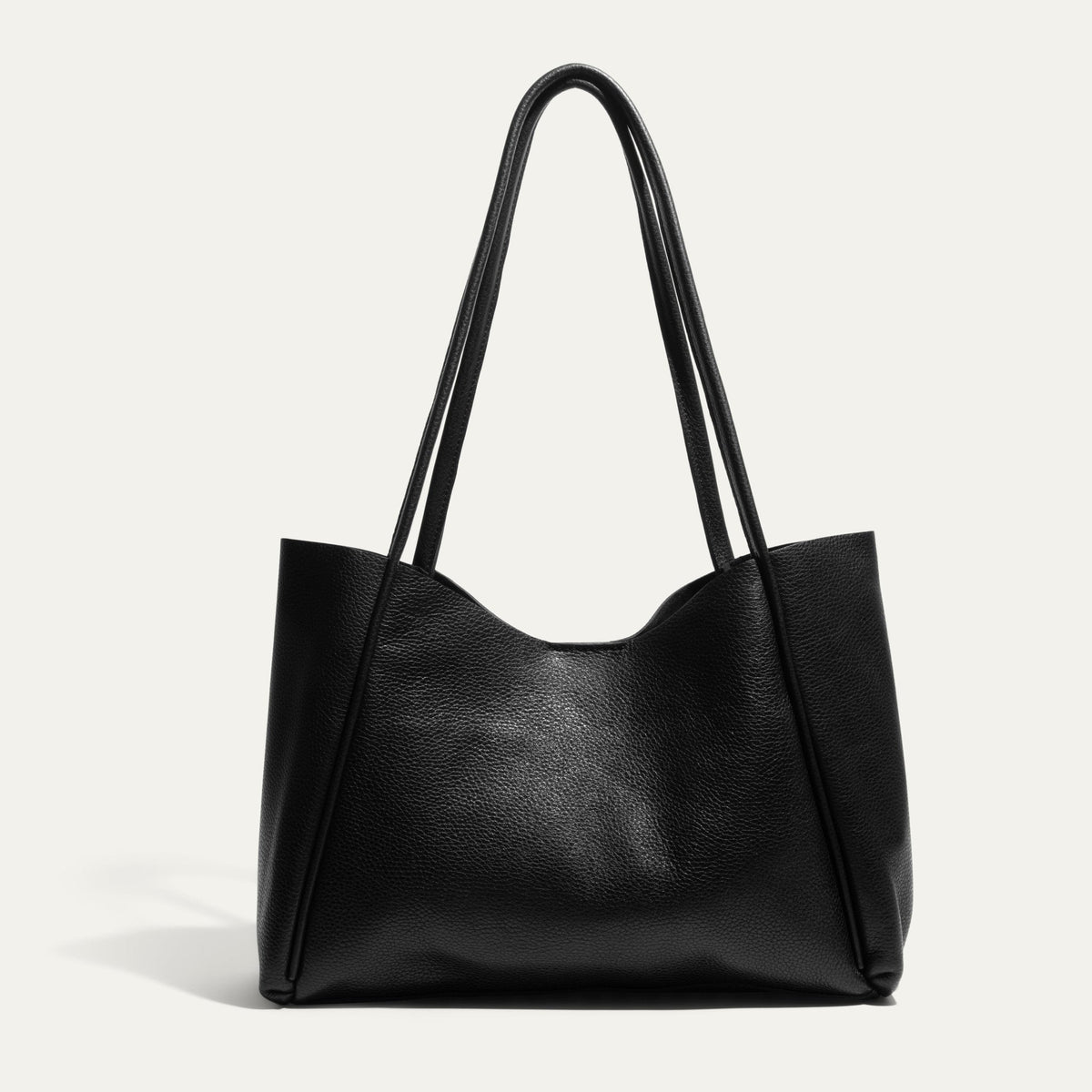 Will Leather Goods Workshop Tote in black pebbled leather, shown front-facing on a white background with tall shoulder straps.