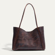 Will Leather Goods Workshop Tote in brown pebbled leather with a two-tone patina, shown front-facing on a white background with tall shoulder straps.