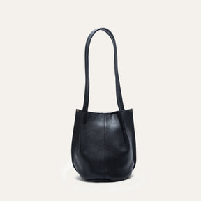 Will Leather Goods black leather bucket bag, front view with long shoulder straps