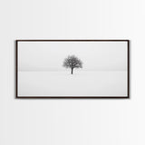Footprints In the Snow Lead To a Lone Dead Tree - Framed Canvas Print - Ready To Hang Art - Moody Wall Art - Black and White Photography Print