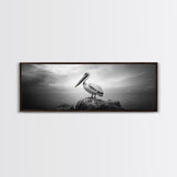 Coastal Pelican, Ocean Rock, Tranquil Wildlife Scene, Framed Canvas Print, Beach House Wall Art, Seaside Nature Decor, Moody Tones