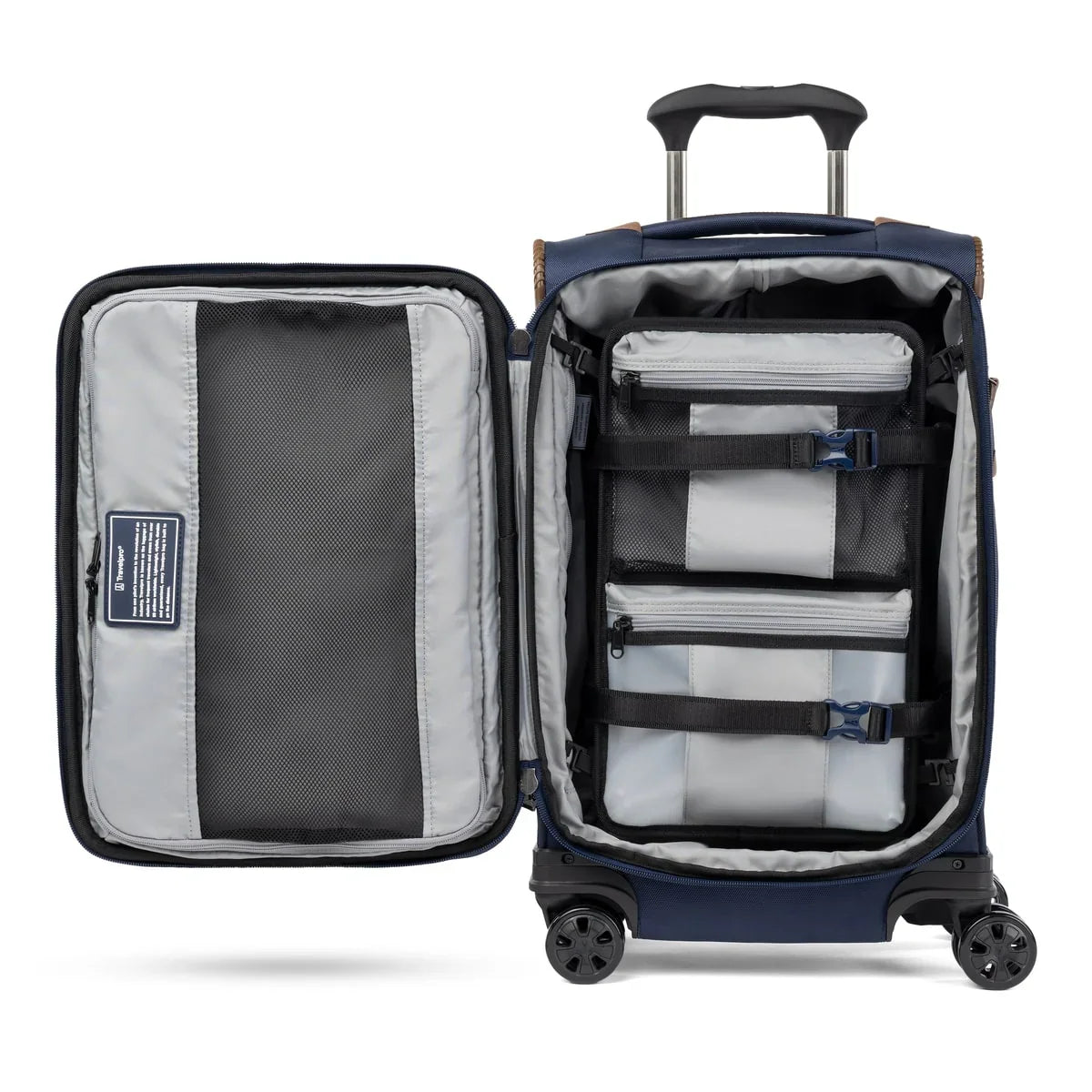 Open Travelpro Crew Classic compact carry-on spinner showing the removable compression packing organizer