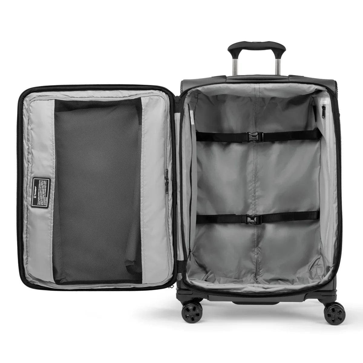 Interior of the Travelpro Crew Classic medium check-in spinner with hold-down straps and divider
