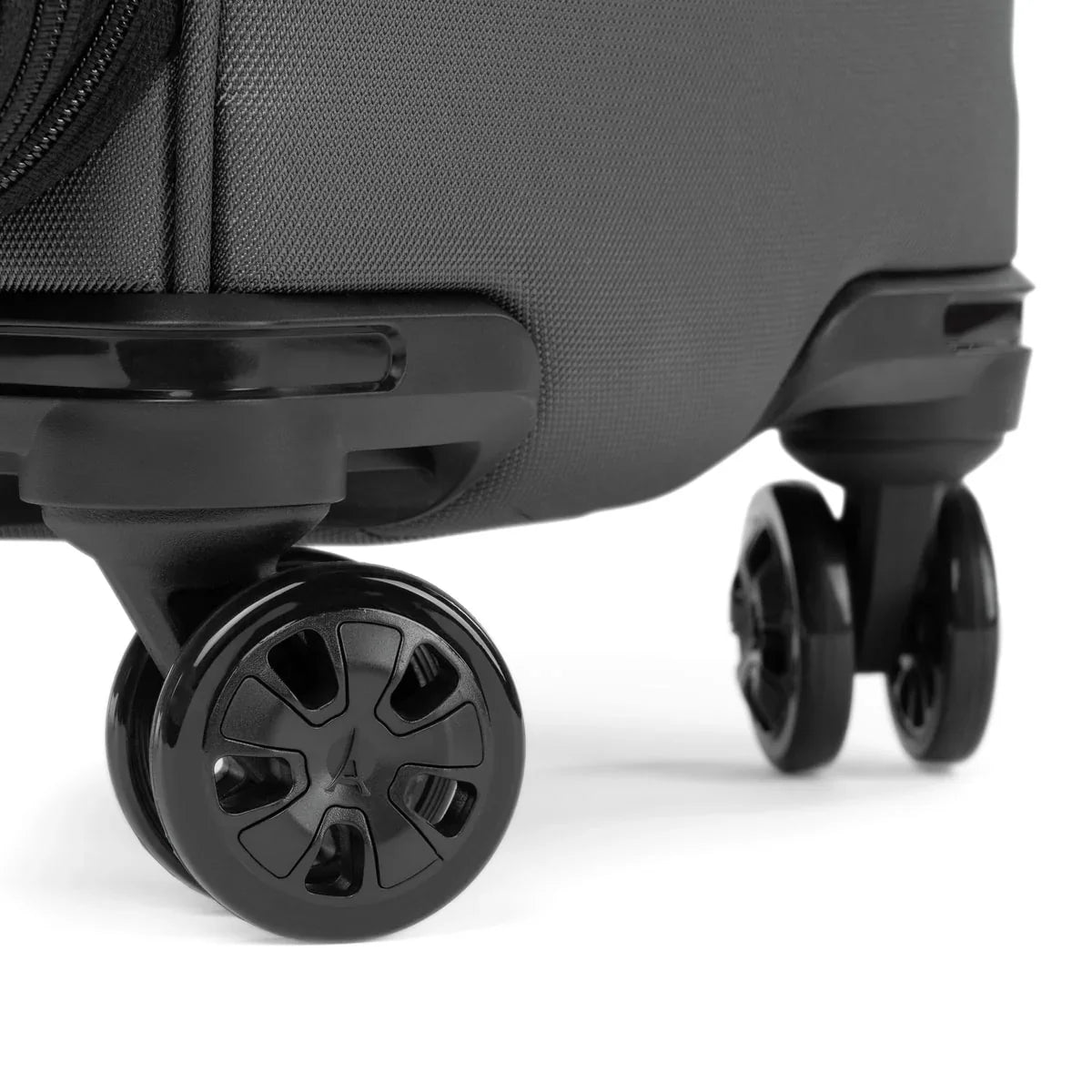 Close-up of the 360° spinner wheels on the Travelpro Crew Classic medium check-in spinner