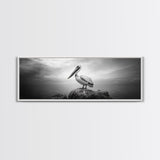 Coastal Pelican, Ocean Rock, Tranquil Wildlife Scene, Framed Canvas Print, Beach House Wall Art, Seaside Nature Decor, Moody Tones