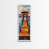 Colorful Pier, Archway, Water — Framed Canvas Print of a vibrant pier scene, coastal wall art, boho lake house decor, office accent