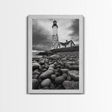 Lighthouse Shore Rocks, Coastal Beacon, Moody Clouds, Framed Canvas Print, Nautical Wall Art, Rustic Beach House Decor, Fall Storm Style