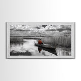 Solitary Canoe, Peaceful Waters, Cloudy Sky, Red Shirt, Framed Canvas Print, Nature Explorer Gift, Cabin Wall Art, Rustic Fall Scene