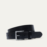 Will Leather Goods black leather belt coiled, showing the brushed nickel roller buckle