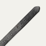 Close-up diagonal view of the tapered tip end of the black leather Bridal Belt, showing the embossed cow-head logo and row of sizing holes.