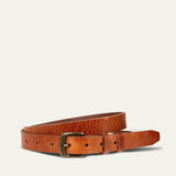 Tan pebbled-grain leather belt with double keeper loops and a brass buckle, coiled, front angled view.