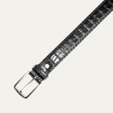 Close-up of the black Croco Belt's silver buckle and belt loop keeper on the crocodile-embossed leather strap, product shot on a white background.