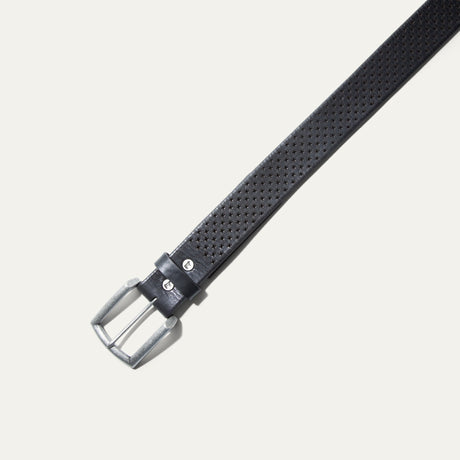 Close-up angled view of the black leather belt showing the brushed silver buckle and star-shaped perforated pattern