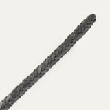 Close-up of the black Five Strand Braided Belt's rounded, buckle-free tip end, showing the five-strand leather braid.