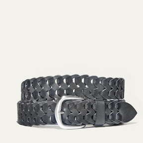 Black woven leather W Link belt coiled flat, showing the full herringbone braid and brushed silver buckle